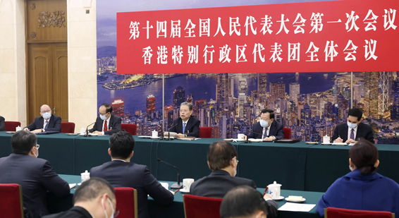 赵乐际分别参加香港代表团澳门代表团审议