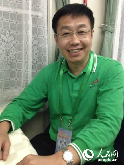 &ldquo;共和国之旅--桂港青年共筑中国梦 广西专列团&rdquo;荣誉会长、中央人民政府驻香港联络办公室九龙工作部部长何靖。（摄影：曹海扬）